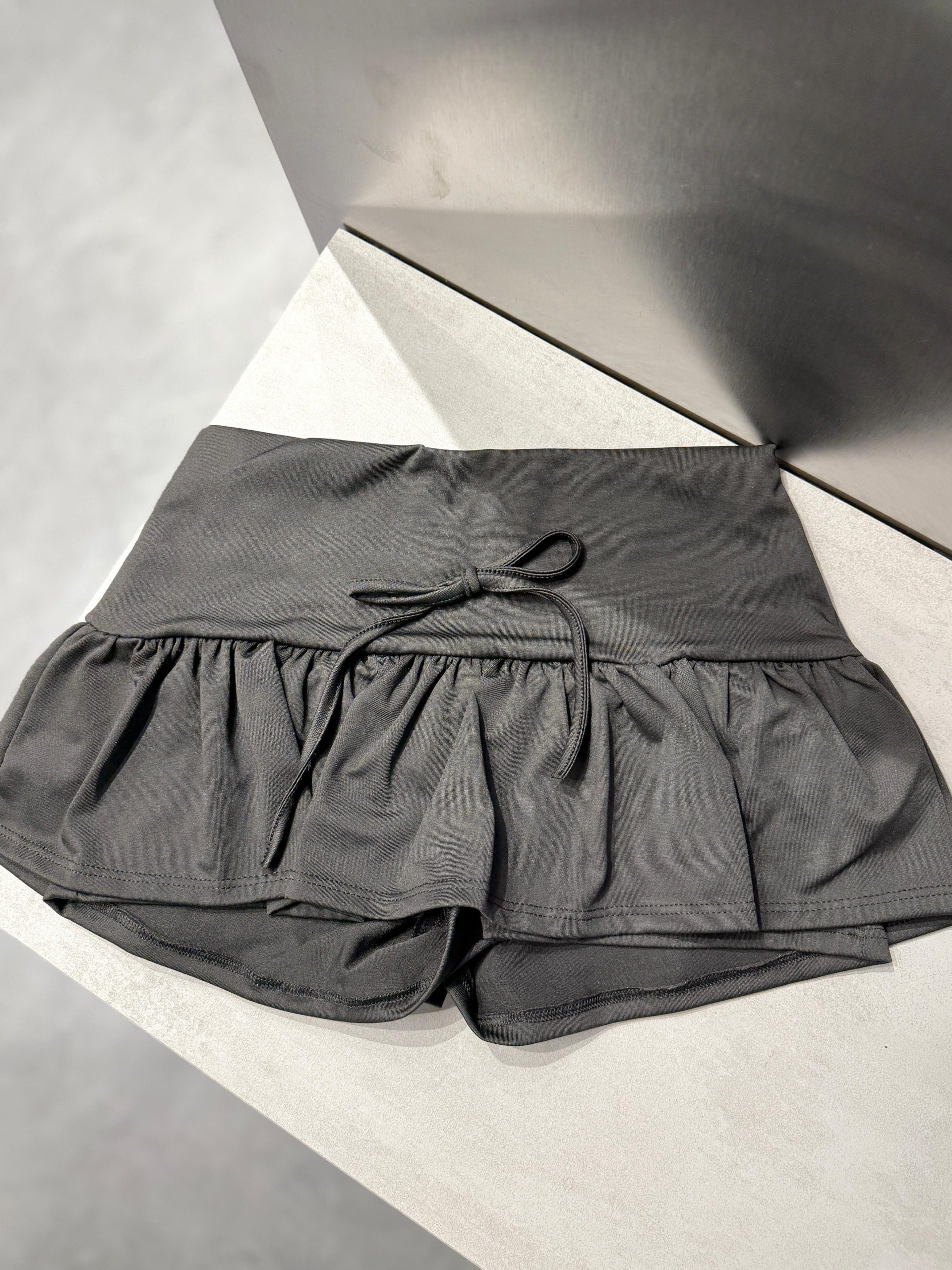 SHORT POLLERA MICROFIBRA VOLADO